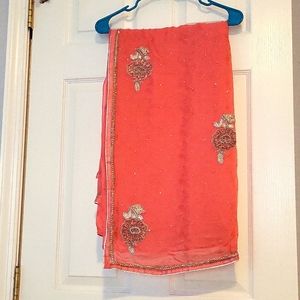 Beautiful georgette self embossed saree in peach pink color